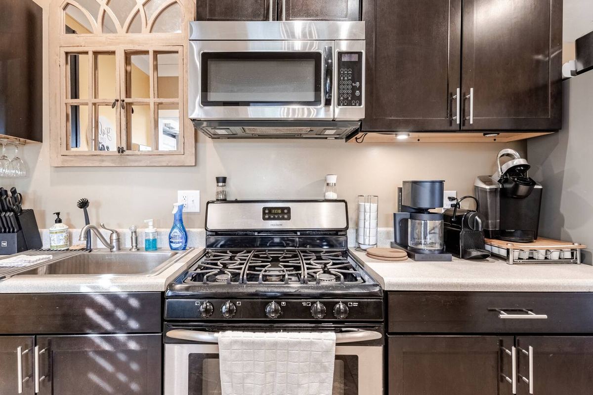 The Milkbarn caterer's kitchen with gas range and stainless appliances