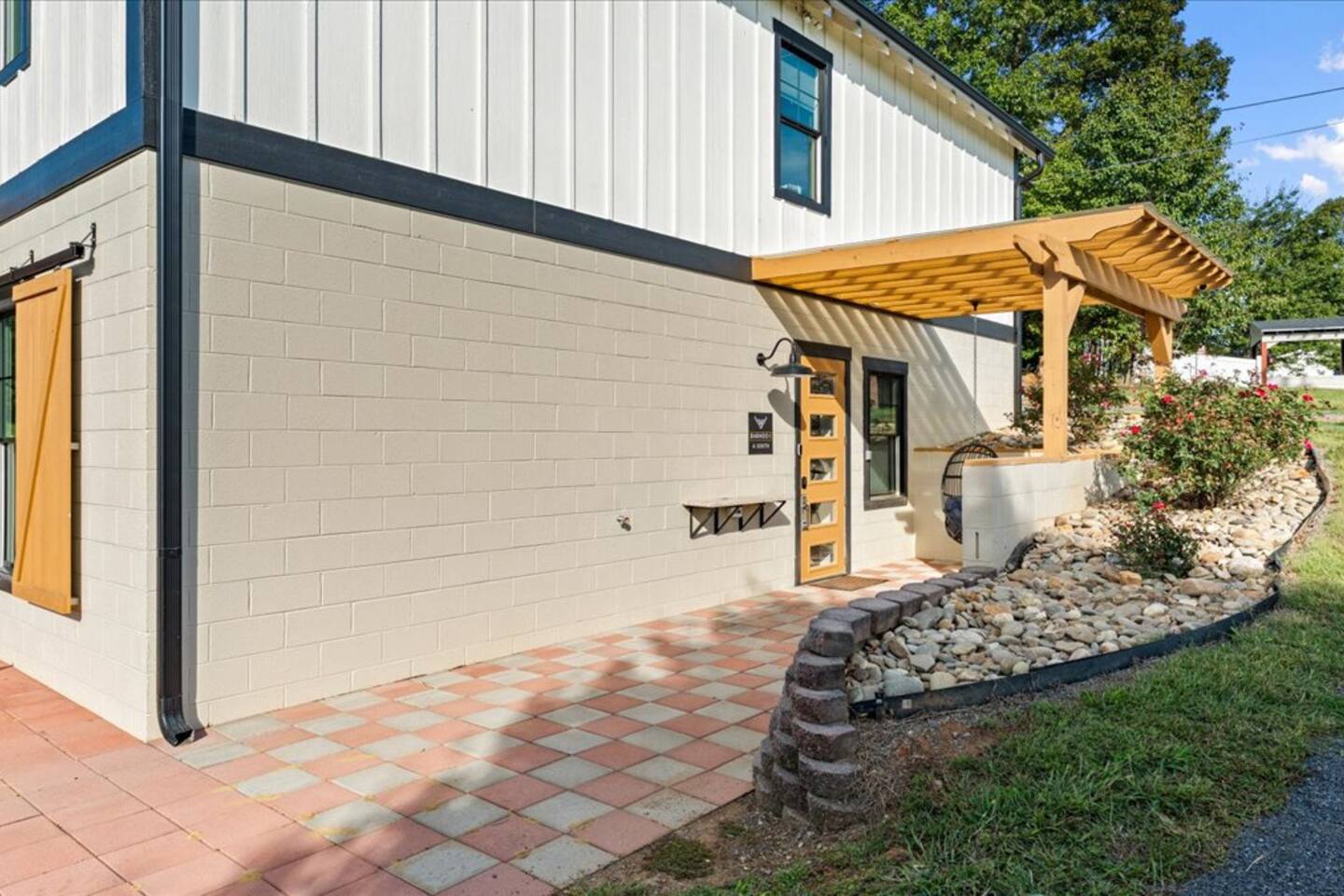 Barndo 1AS at Cedar Pond Farms in Jefferson City — a one-bedroom barndominium suite on a working farm with Scottish Highland cattle.