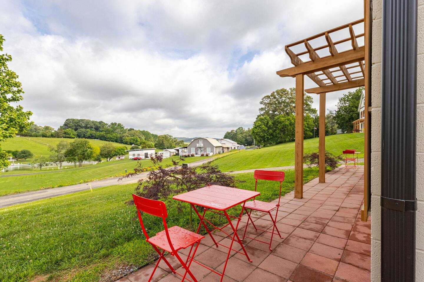 Inside Barndo 1AS, a one-bedroom barndominium suite at Cedar Pond Farms — our fluffy Highland cow farm just outside the Smoky Mountains.