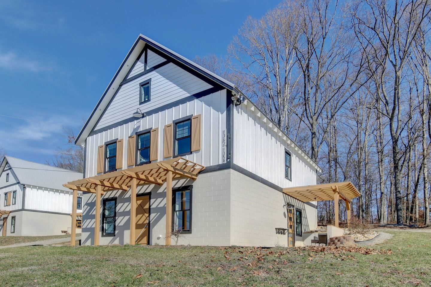 Barndo 1AS at Cedar Pond Farms in Jefferson City — a one-bedroom barndominium suite on a working farm with Scottish Highland cattle.