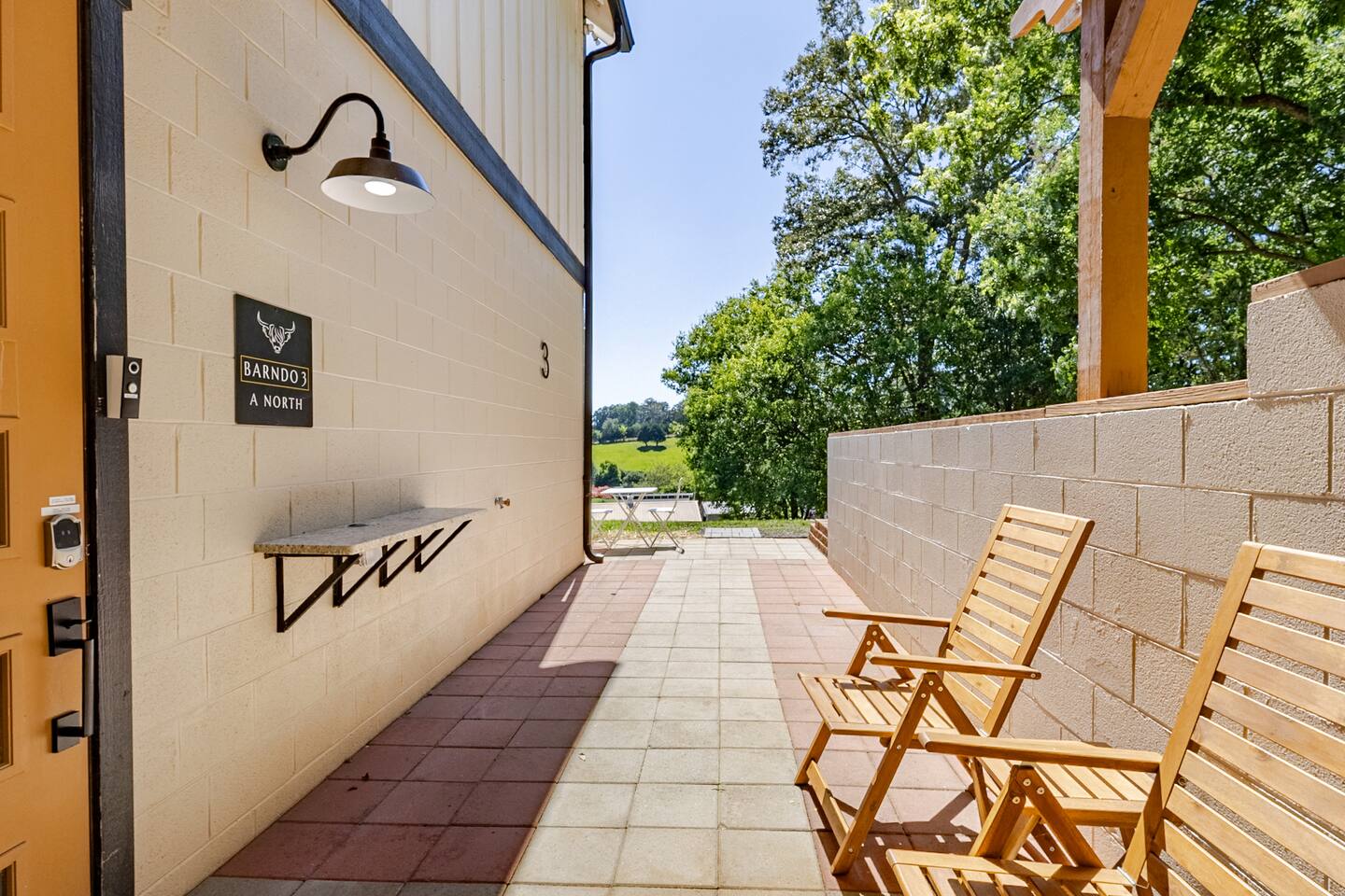 Barndo 3AN at Cedar Pond Farms in Jefferson City — a one-bedroom barndominium suite on a working farm with Scottish Highland cattle.