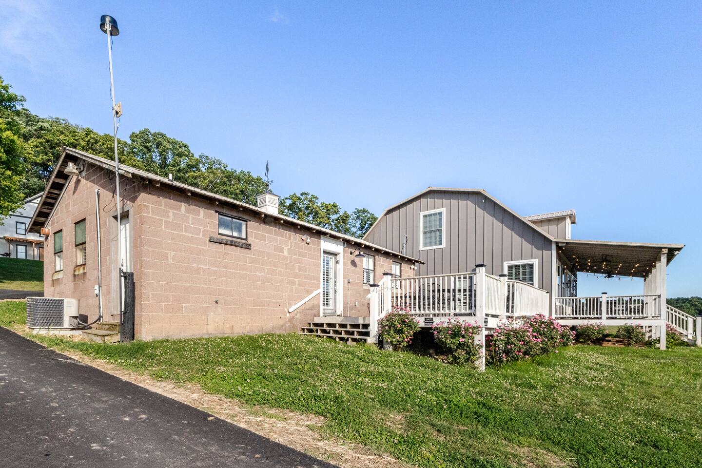 Milkbarn Farm Stay at Cedar Pond Farms — converted Milkbarn farmhouse lodging on the farm, with the Highland herd a short walk away.